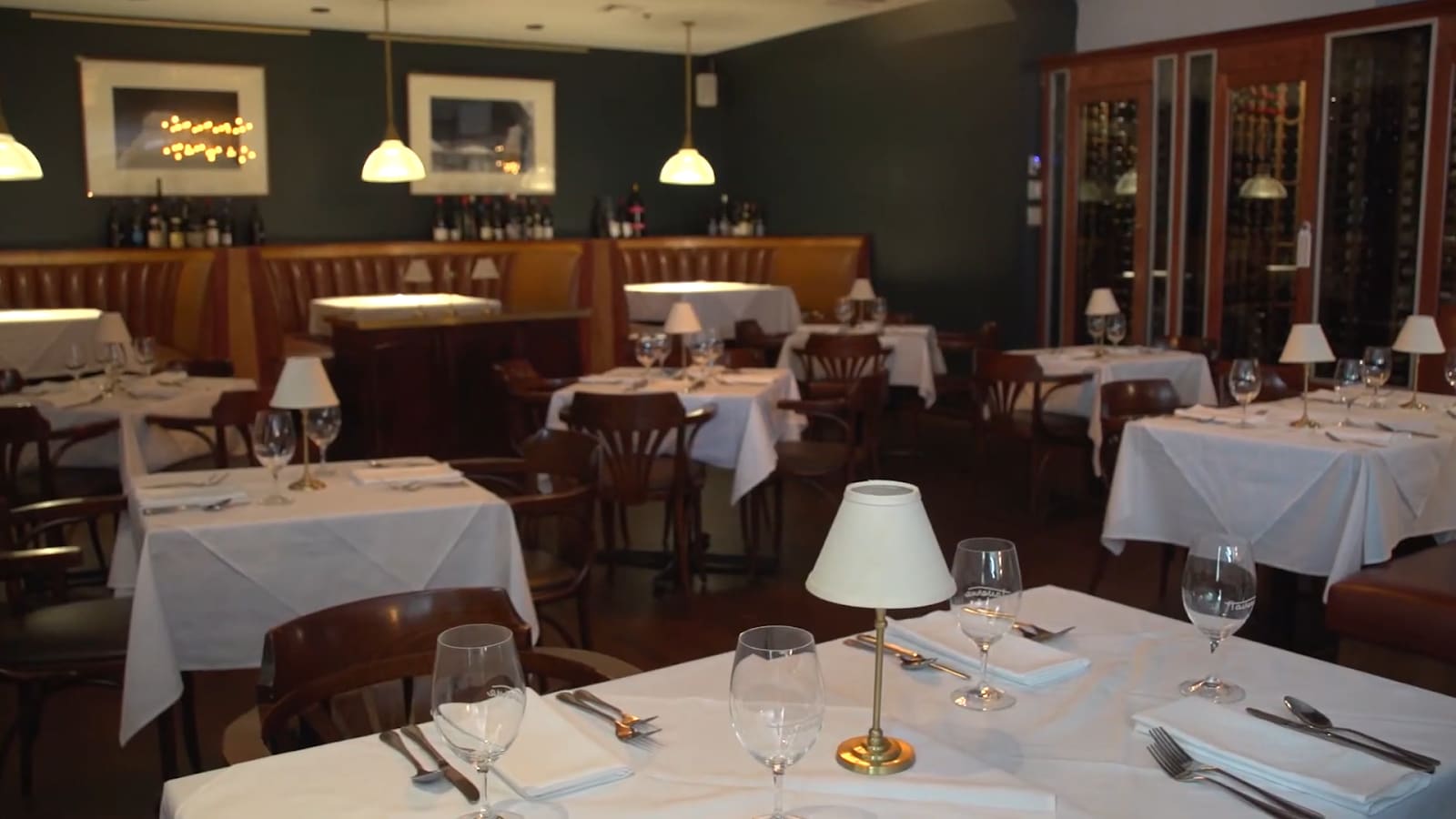 The elegant dining area of Tavern in the Square with set tables