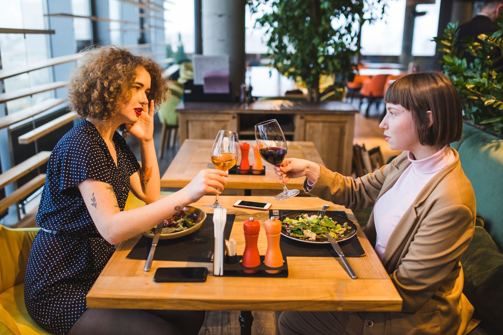 Friends eating in restaurant