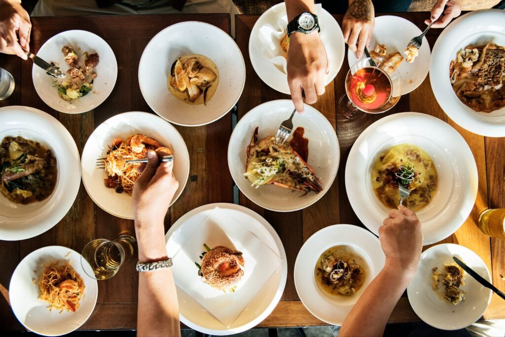 Top view of people try different food